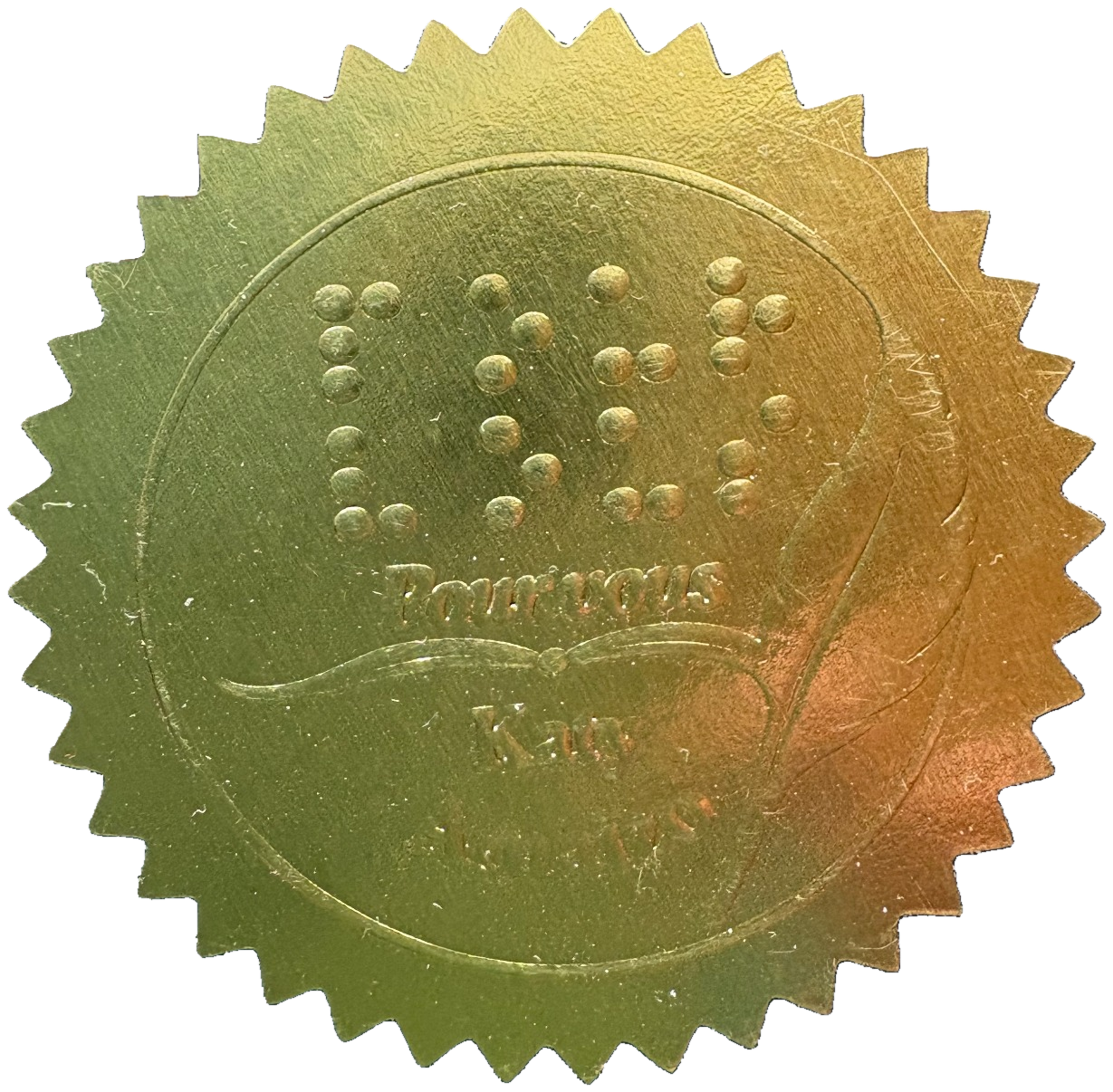 Pastille dorée portant en braille les mots Pour vous